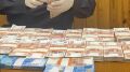 Полицейские Коми пресекли хищение 11 млн рублей у двух пенсионеров, задержав пособницу мошенников